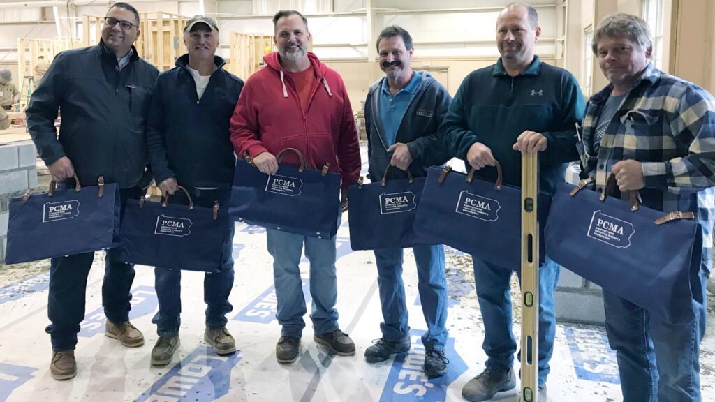 Pennsylvania Masonry Instructors with Tool Bags awarded to their top students